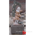 stone girl fountain with tree statue